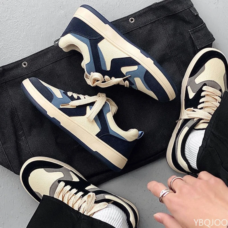 新しい春と秋のファッショナブルな多用途メンズシューズミニマリスト通気性メンズフラットカジュアル快適なキャンバスシューズ