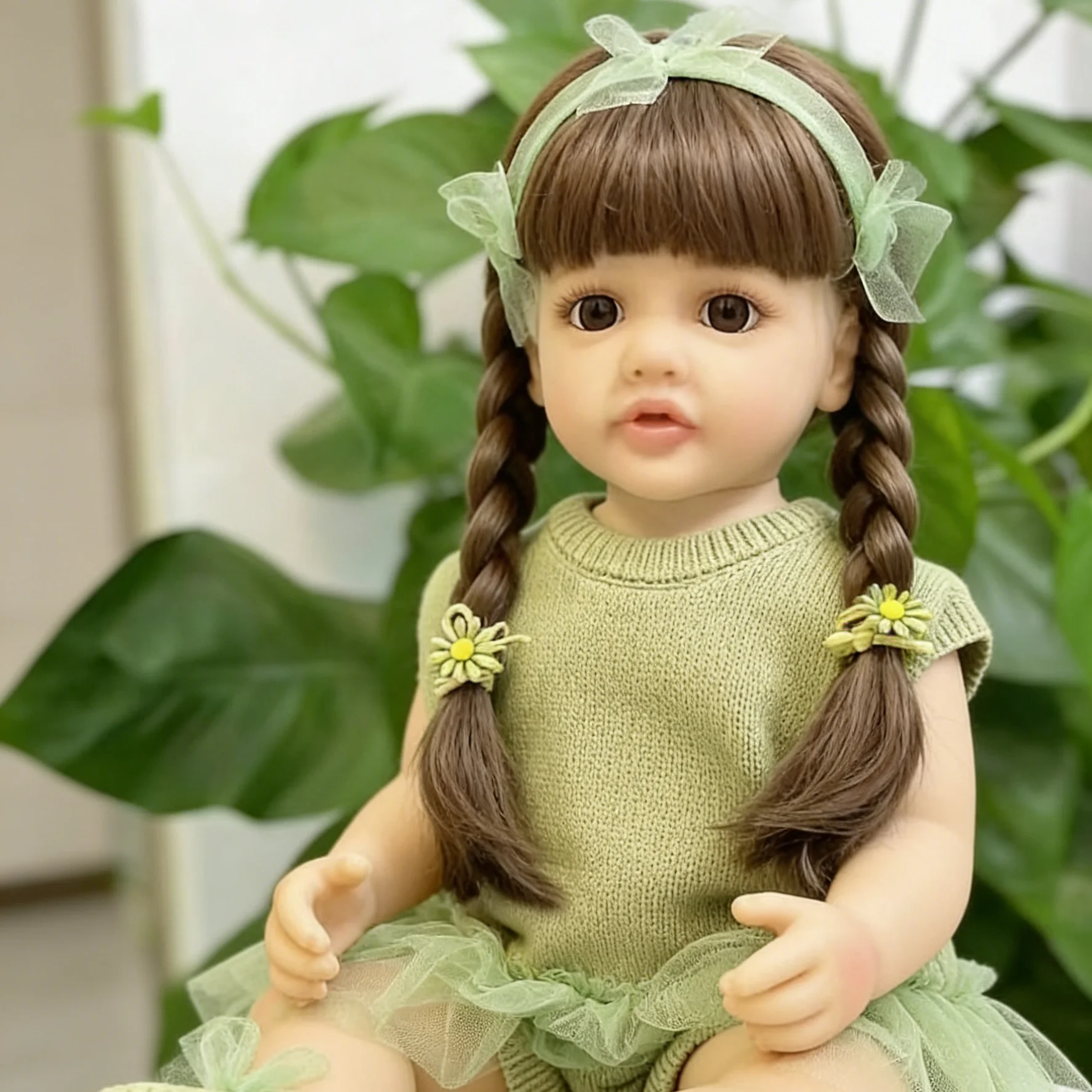 

Reborn Baby Girl Doll, Soft Vinyl Realistic Toddler Doll with Long Braids & Green Knit Dress, Collectible Toy