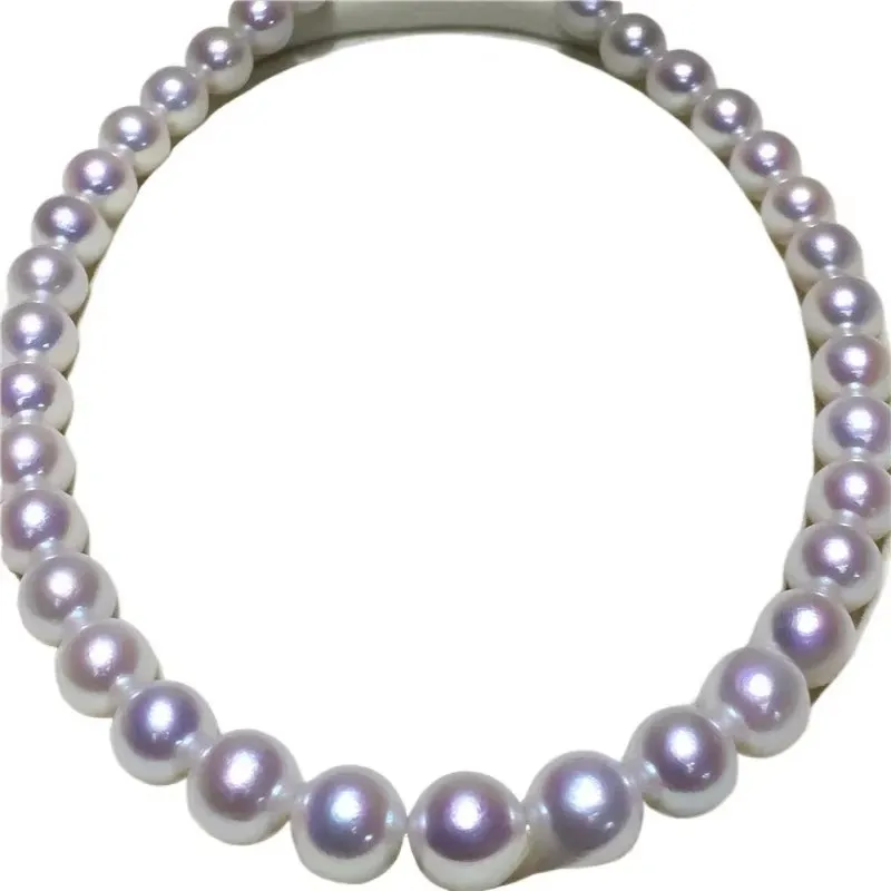 

Ювелирные изделия из белого круглого жемчуга диаметром 12-15 мм