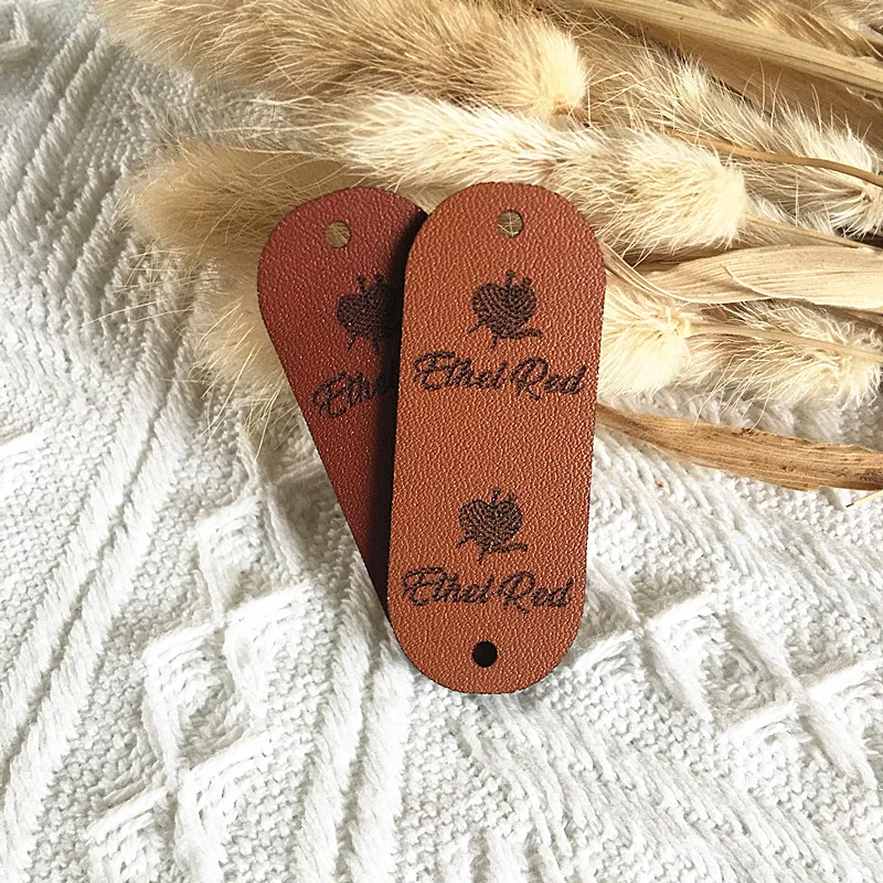 

30pcs Custom logo leather tags with rivets Handmade labels for clothes knitting Sewing center fold crochet craft items label