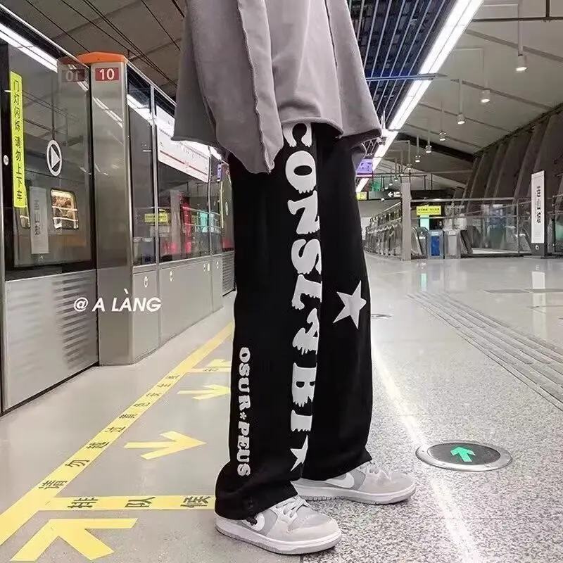 

High street ins pants for men in spring and autumn, niche design, printed loose straight leg wide leg sports and casual pants