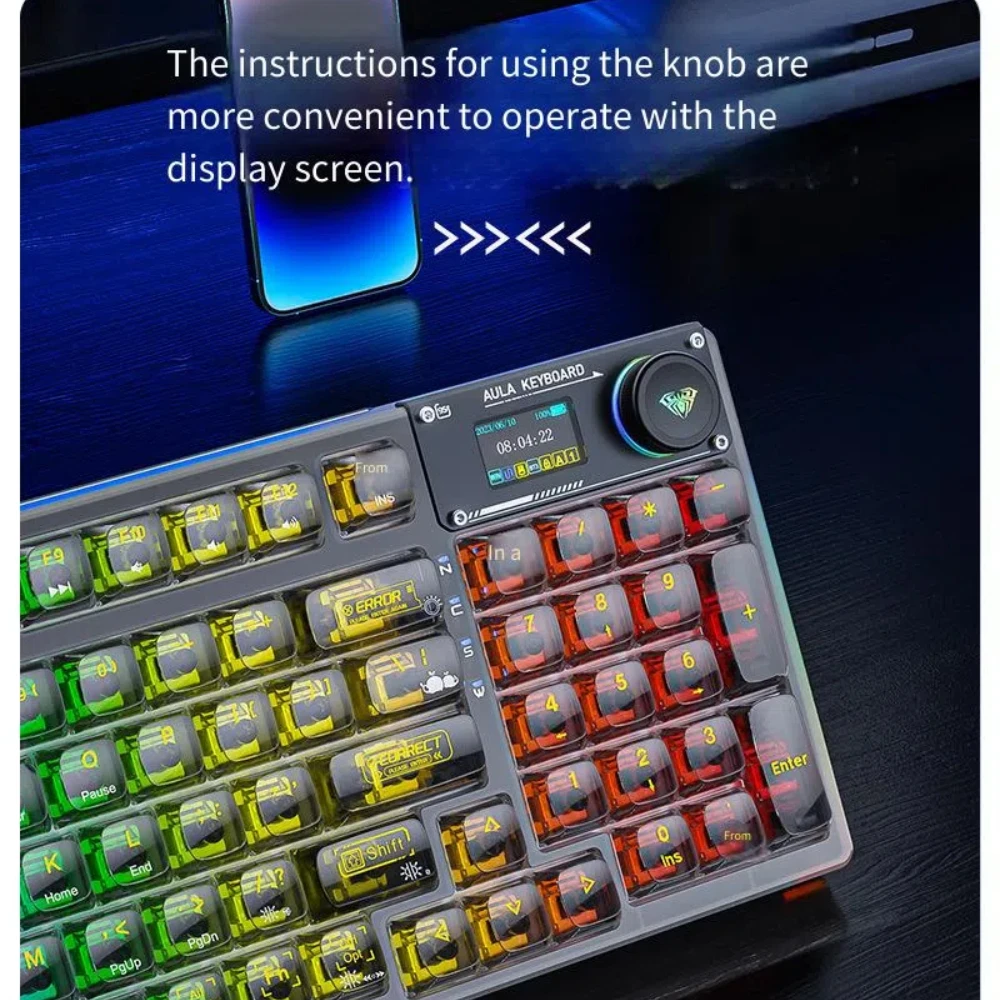 Le clavier mécanique à trois modes Bluetooth sans fil transparent F98pro comprend une structure de joint en cristal de glace et est échangeable à chaud