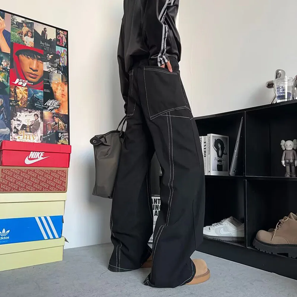 夏のメンズだぶだぶのジーンズソリッドカラーシームオーバーオール大きなポケットカジュアルファッショントレンドストリートヒップホップシンプルなニッチメンズボトムス