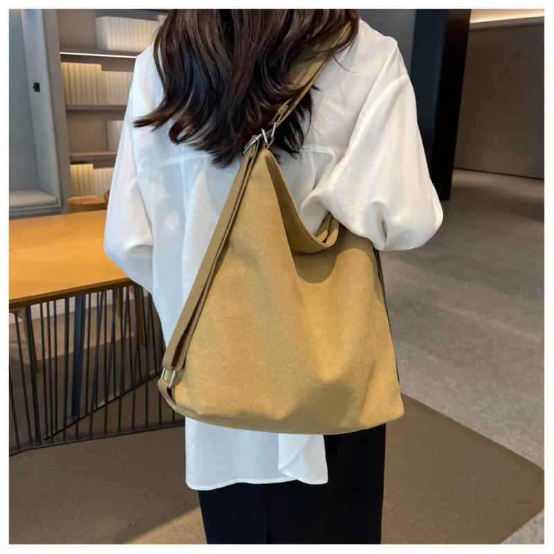 

Women's 2024 New Single and Double Shoulder Fashion Canvas Face Solid Color Large Capacity Multi functional Crossbody Bag