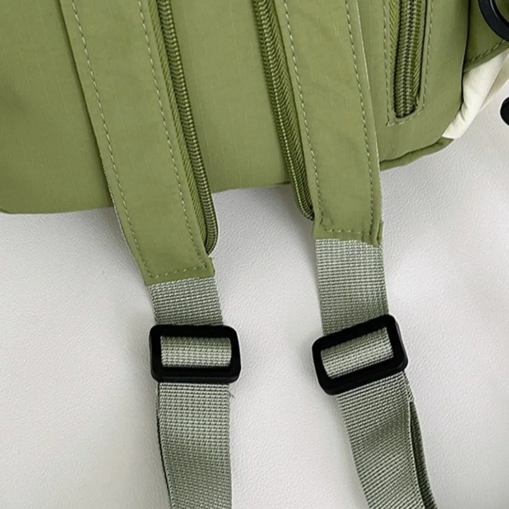 حقيبة ظهر نسائية كاجوال على الطراز الكوري ذات سعة عالية من النايلون حقيبة مدرسية للطلاب خفيفة الوزن من النايلون لطلاب الجامعات #1