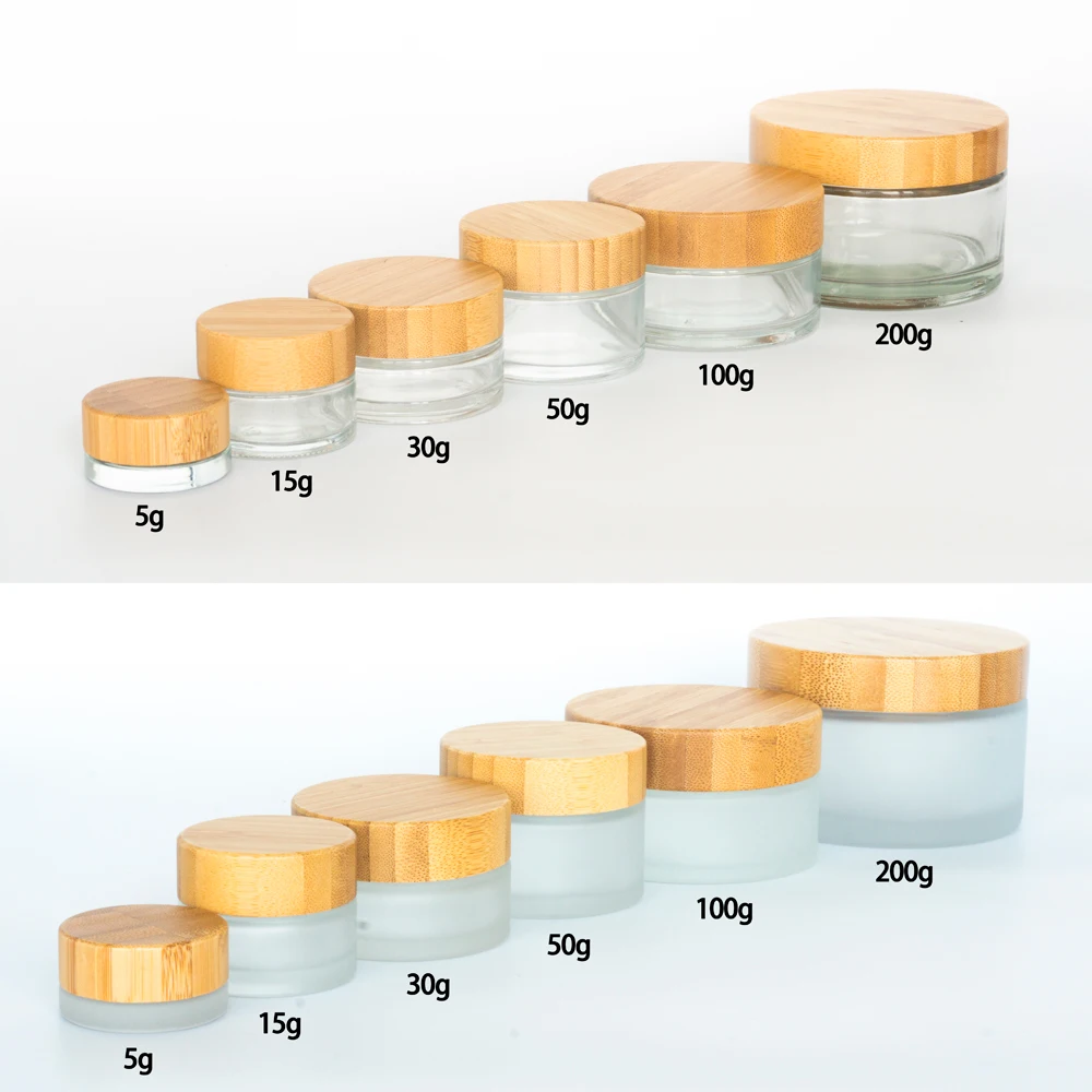 

Wholesale 150g 15g 30g 50g 100g 200g cosmetic bamboo lid glass container 1 oz face cream frost glass jar with bamboo cap