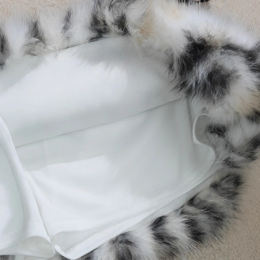 Lage taille pluizige luipaardprint minirok dames retro subcultuur heuprok