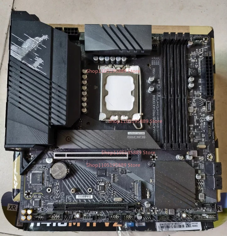 

Материнская плата Gigabyte B660M AORUS PRO AX DDR4, интерфейс LGA1700, с модулем Wi-Fi, поддерживает процессоры 12/13/14-го поколений.
