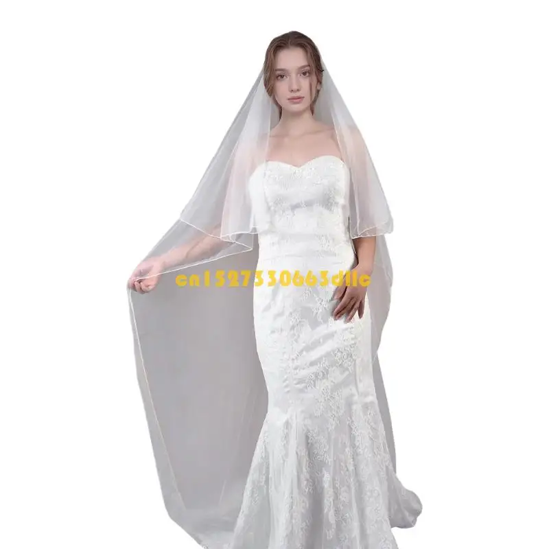 veus-formais-casamento-124a-com-trem-estendido-classico-cor-branca-tecido-transparente-elegante-decoracao-laco