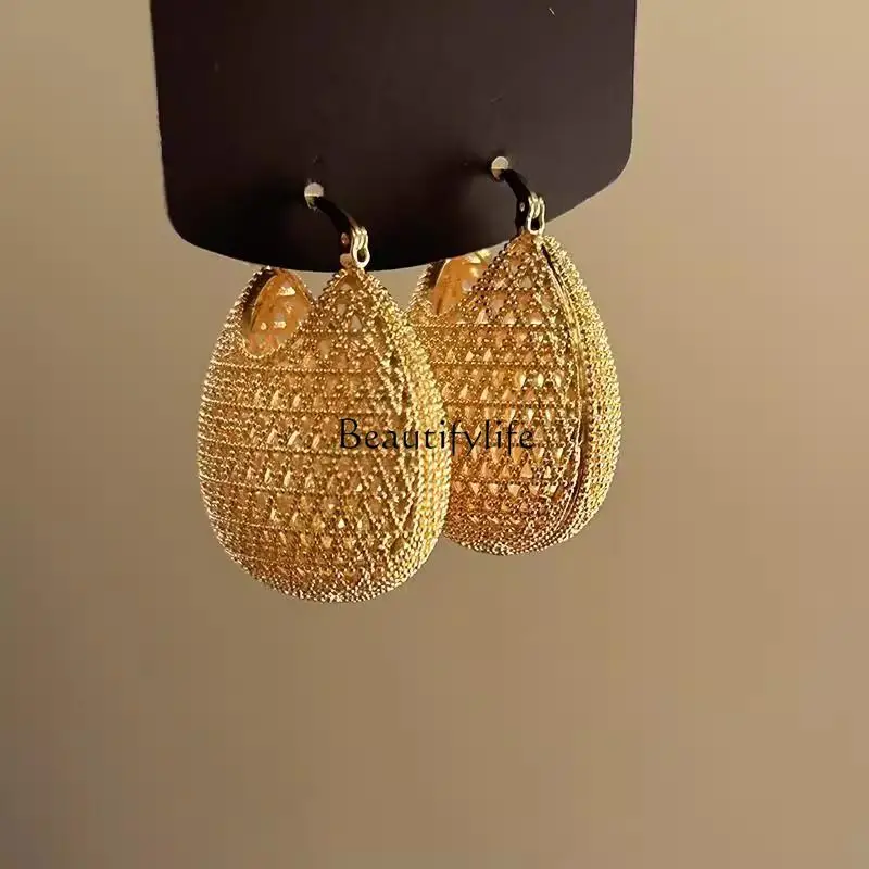 French hollow gold money bag earrings sterling silver light luxury high-end retro annual meeting earrings