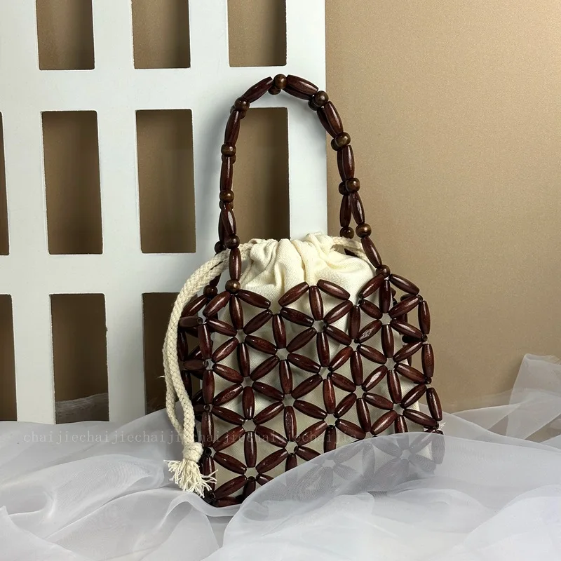 Summer retro new woven bead bag, fashionable hollow out high-end women's bag