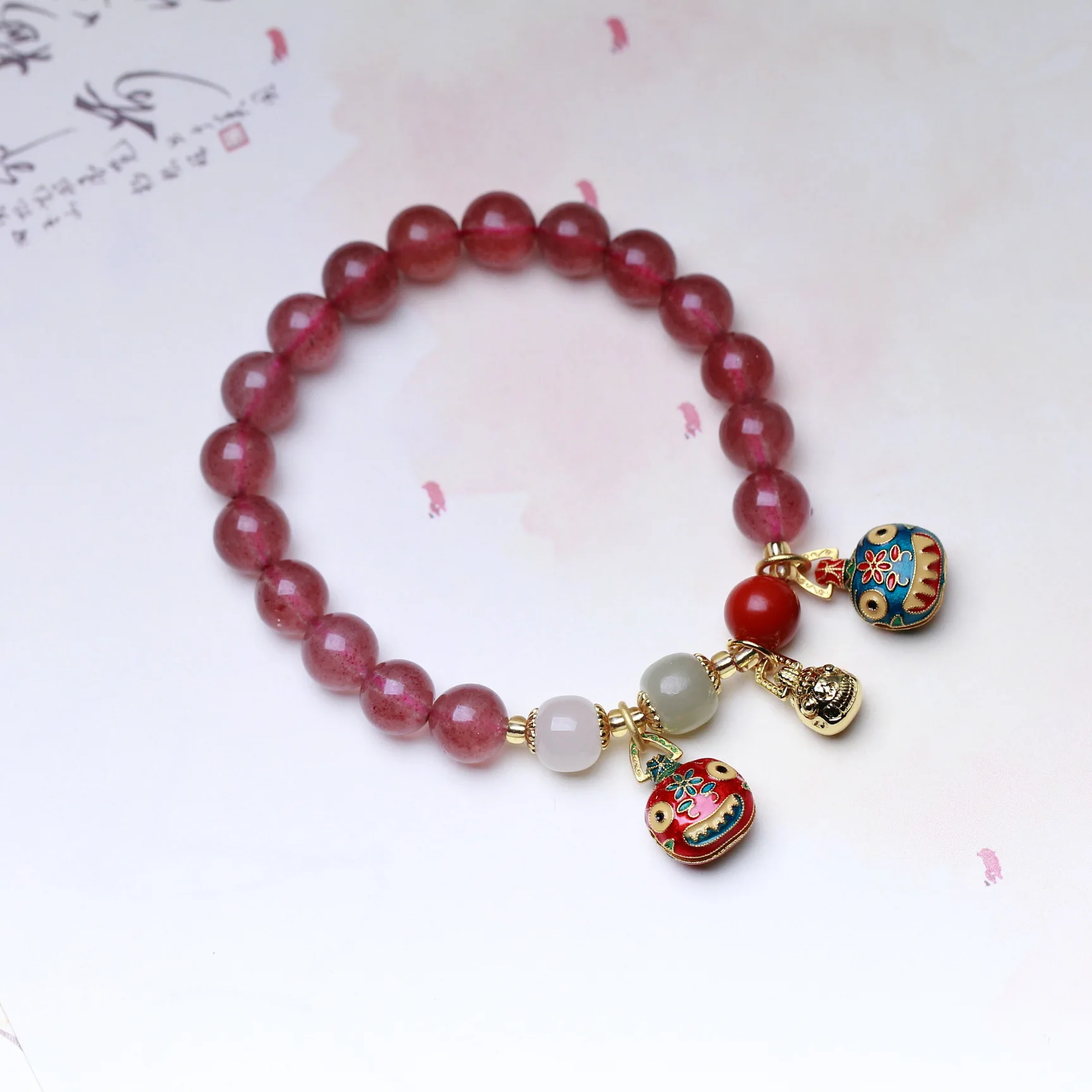 

Natural Strawberry Crystal Bracelet with Hetian Jade Old Pearl Cinnabar Golden Gobbler, a Member Creative Single Ring Bracelet