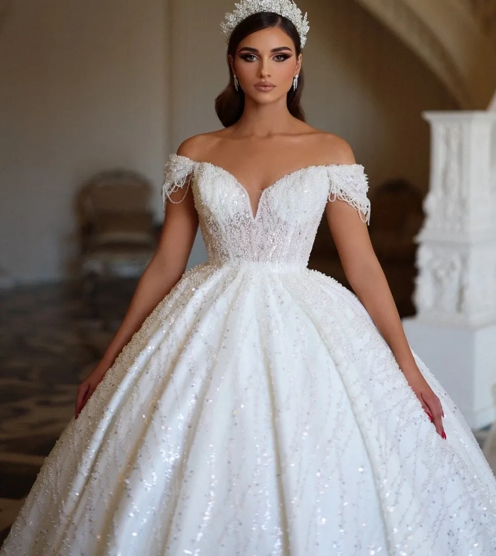 2025 Abito da sposa con paillettes di lusso con spalle scoperte Perline Appliques Abito da ballo Abiti da sposa Abiti da Noiva personalizzati