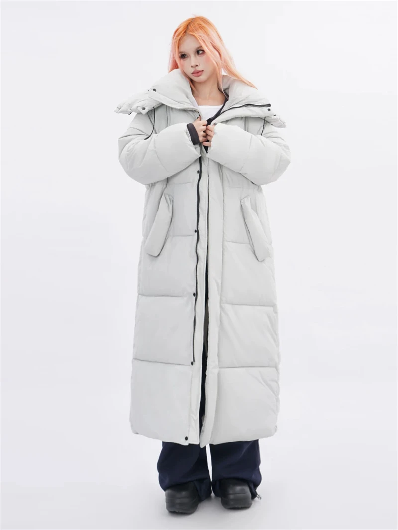 Casaco de Inverno Feminino Acolchoado Quente com Capuz 2026 Novo Casaco Longo de Pluma Coreano Solto de Algodão