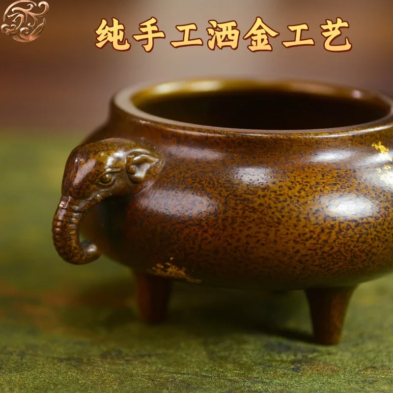 Gold-sprinkled, small elephant-shaped incense burner, a collectible item for enthusiasts, a copper incense burner for the office