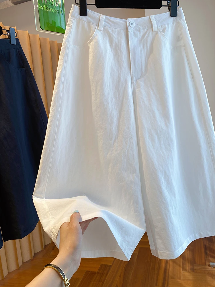 Białe szerokie spodnie damskie letnie cienkie z wysokim stanem luźne codzienne proste wyszczuplające do połowy łydki do pracy