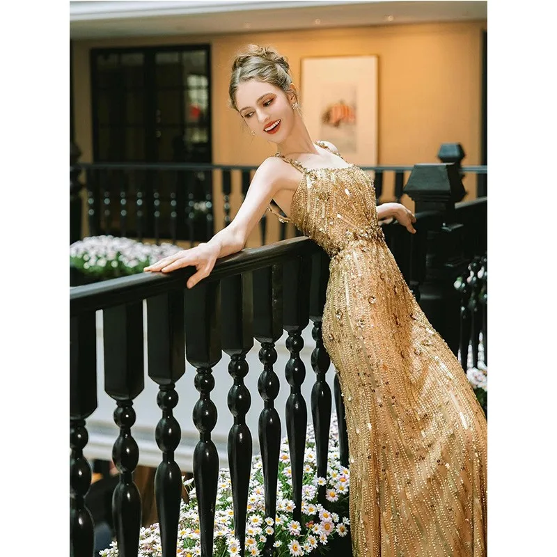 

A new golden banquet style host fishtail dress and toasting