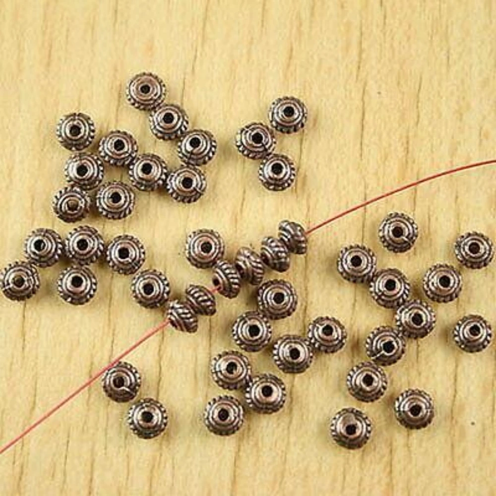 200PCS 4.6x2.8mm hole is 1.1mm COPPER-TONE OBLATE SPACER BEADS H2266