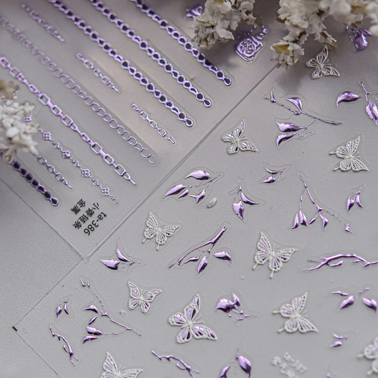 

Hot Stamping Purple Line Love Heart Lace Bowknot Chain Branches Star Flower Leaf Butterfly Plant Flower Nail Art Stickers Decals