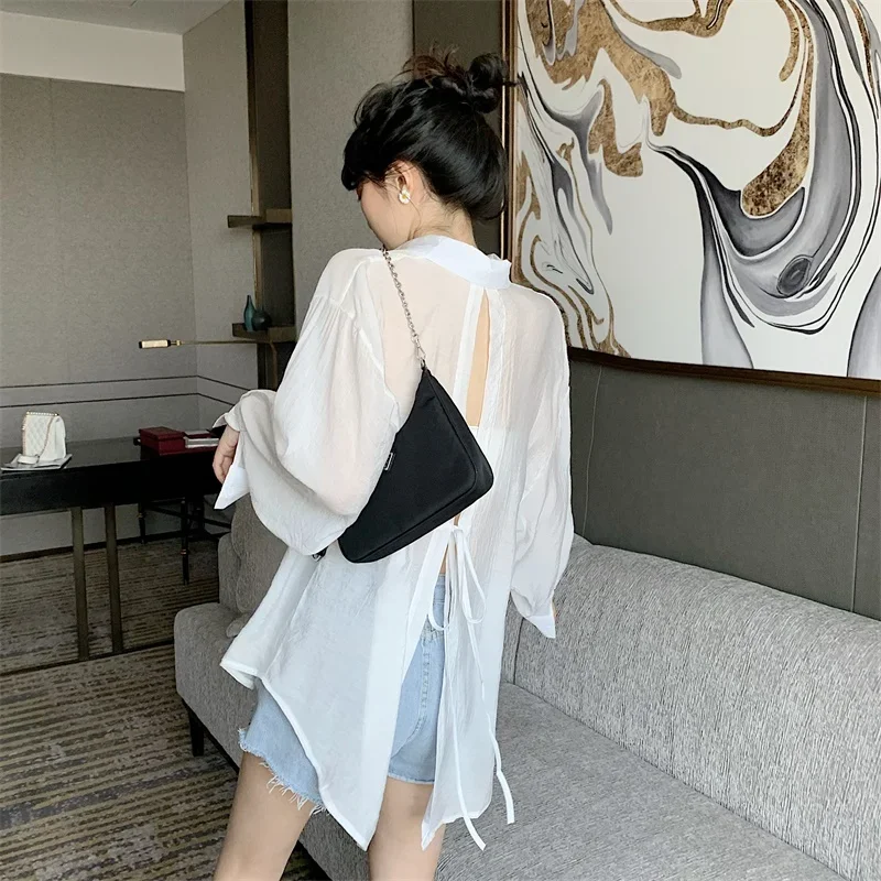 Koszule damskie cienkie letnie odporne na słońce wiązanie z tyłu elegancki design przezroczyste seksowne damskie pojedyncze piersi Casual Holiday Baggy Fit Blusas