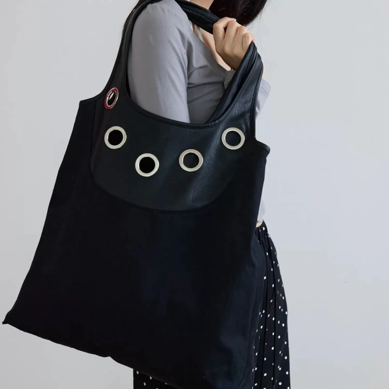 

Retro Cotton Leather Patchwork Rivet Shoulder Bag 2026 New Large Capacity Ladies Commuter Canvas Shopping Bag