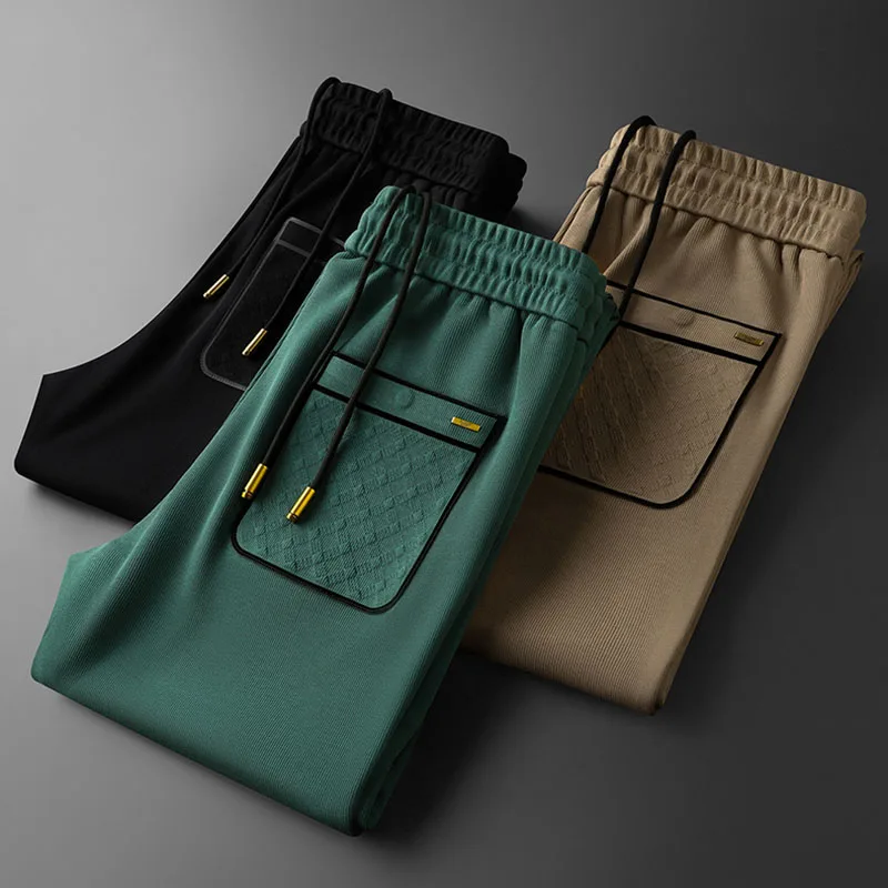 Light luxury good dark green bunched foot sports casual pants men slim pocket pressed autumn men's lace-up small foot pants