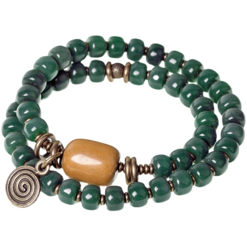 

Retro green yin skin Bodhi root bracelet, female personality literary and ethnic style bead double-layer bracelet.