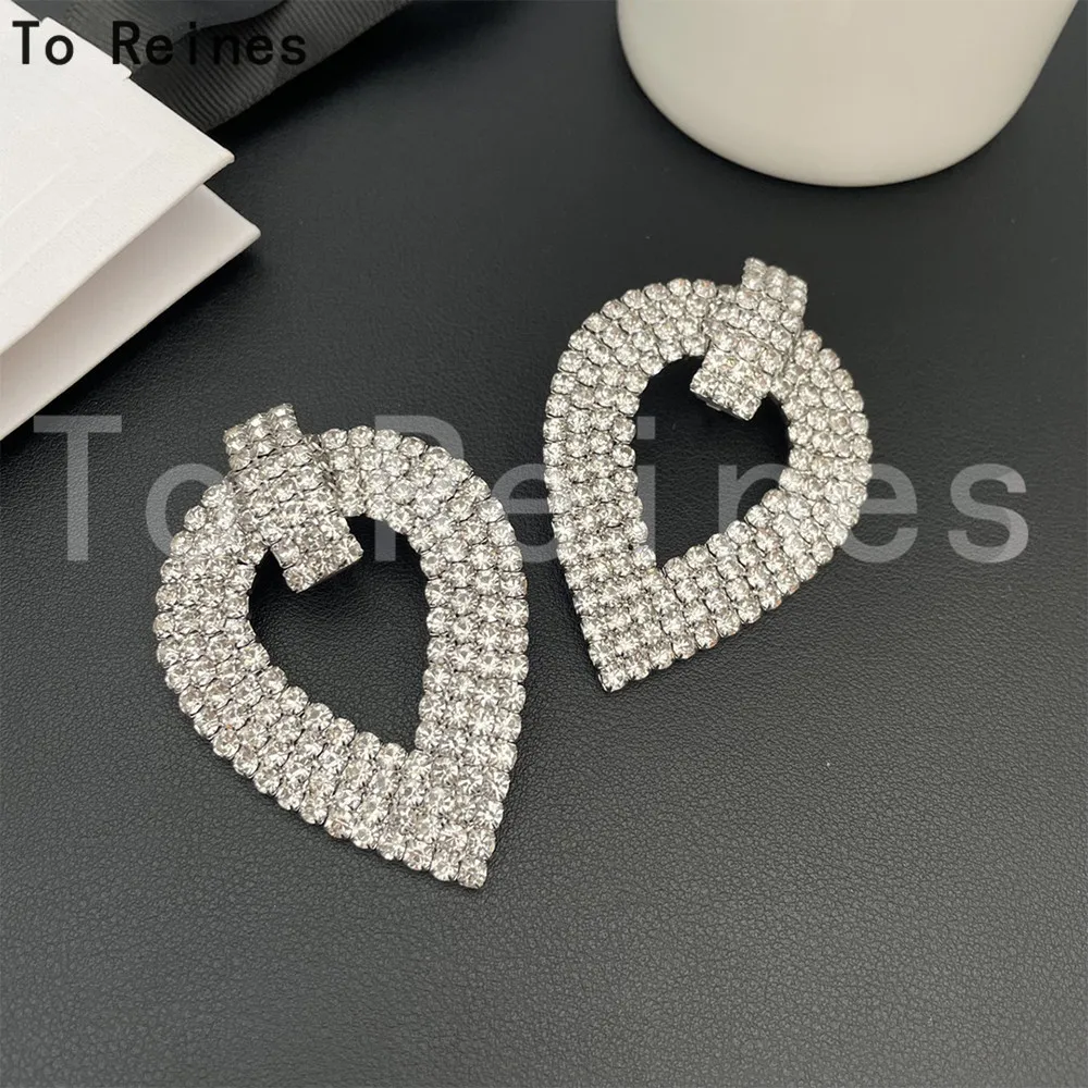 To Reines Exaggerated Hollow Diamond Earrings Women Party Jewelry Symmetrical Geometric Design Ear Clip Shiny Silver Accessories