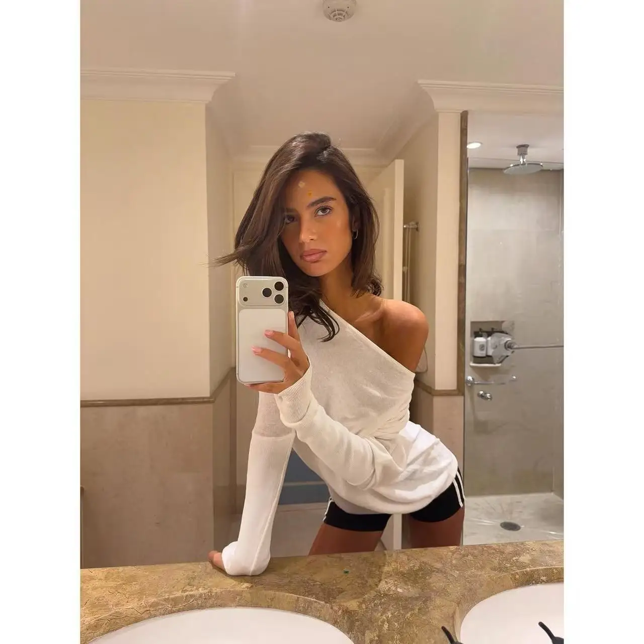 Honey a Stylish and Versatile Long-Sleeved Top with a Slightly Exposed Shoulder Top