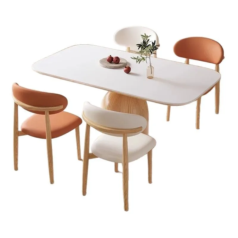 

Solid wood high-grade rock slab dining table and chairs combination log cream style Nordic rectangular small apartment