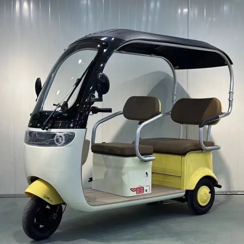 

Electric tricycle with shed to pick up and drop off children Double row passenger and cargo dual purpose