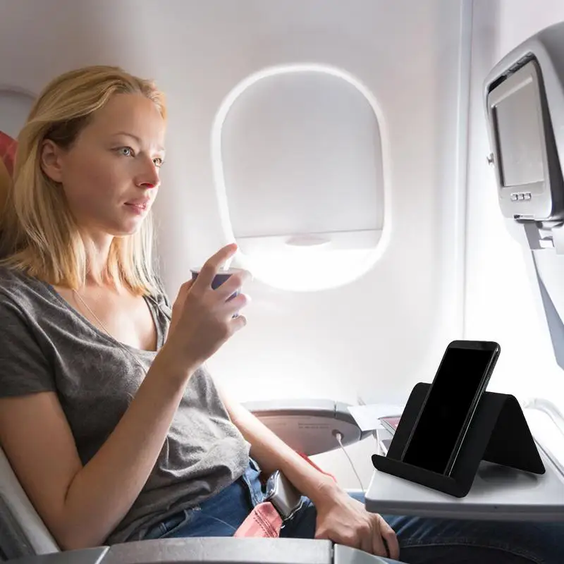 Soporte de teléfono para avión, accesorio de viaje para Smartphone, plegable, Flexible, para escritorio y tableta
