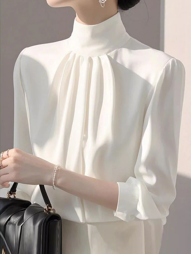 Spring French style unique, beautiful, light luxury, niche, high-end, good-looking white commuter long sleeved shirt