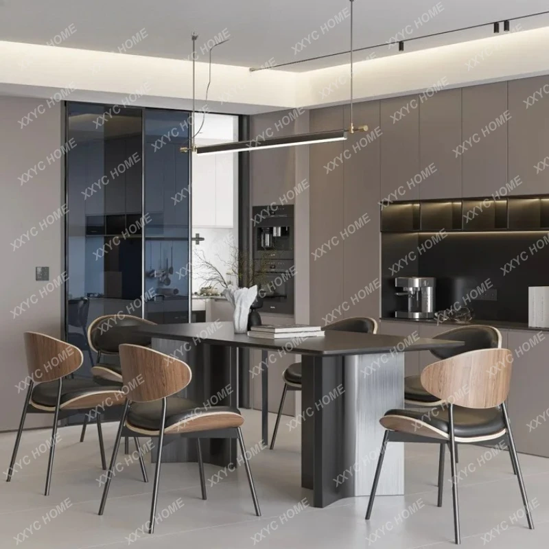 

Минималистичный современный обеденный стол из черной каменной плиты прямоугольной формы для ресторана