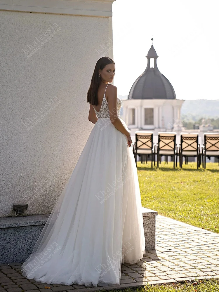Abiti da sposa classici Una linea di tulle Abiti da sposa a strati Applicazioni di pizzo Senza maniche Backless Abiti da sposa Personalizzati 2025