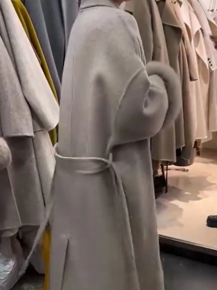 

HH Woman Fashion Long Sleeves Lace-up Belt Decoration Winter Long Coat Female Commuting Pockets Furry Cuffs Solid Loose Coat