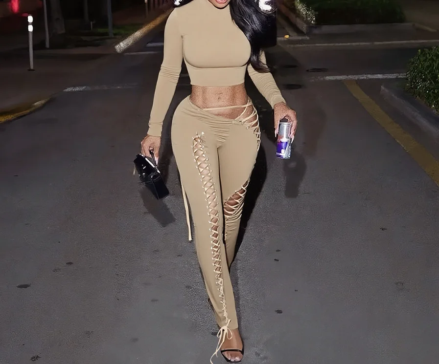 

Sexy Women's 2-Piece Spring New European and American Spicy Girl Exposed Navel T-Shirt and Hollowed Out Rope Tight Pants Set