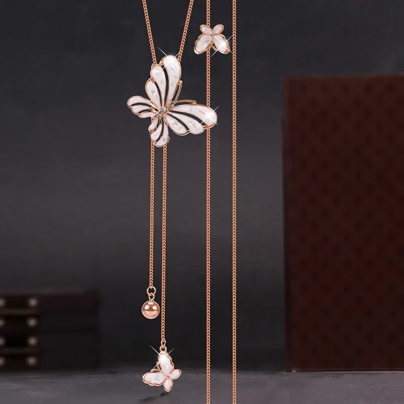 

Новая двойная цепочка для свитера-бабочки — это простое и универсальное длинное ожерелье для женщин, модное ожерелье для одежды.