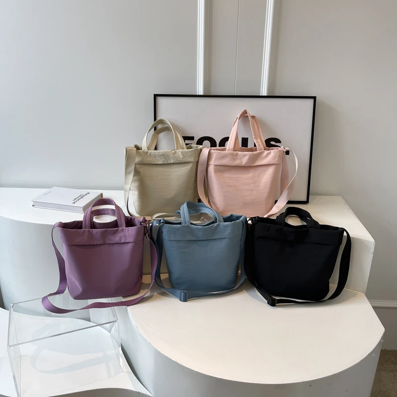 Bolsos de hombro de nailon para mujer, bolsos de gran capacidad, versátiles, sencillos y sólidos, nuevo estilo informal, gran oferta, 2024