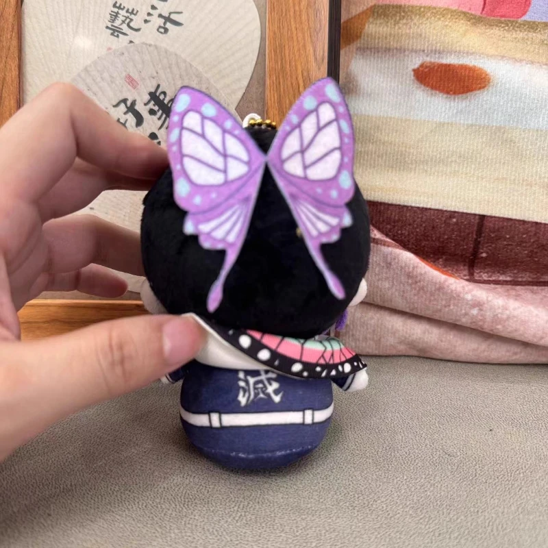 10 سنتيمتر أنيمي دور Kochou Shinobu Iguro Obanai Kawaii تأثيري دمية صغيرة قلادة بلوشيز لعبة أرقام المشجعين جمع الهدايا بلوشي