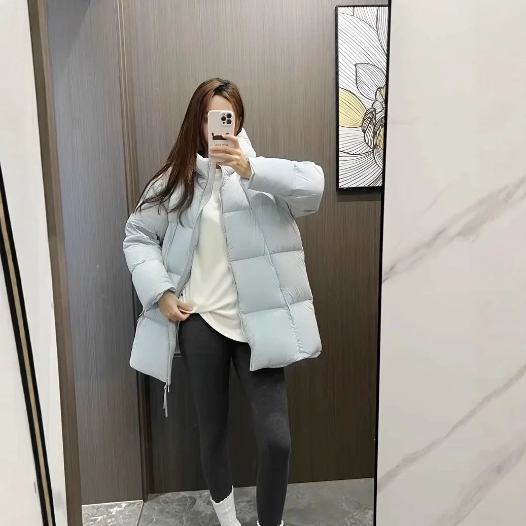 Nueva chaqueta acolchada larga con capucha y cuello de goma prensado para mujer, abrigo ligero de plumón de pato blanco cálido con cuello alto para invierno