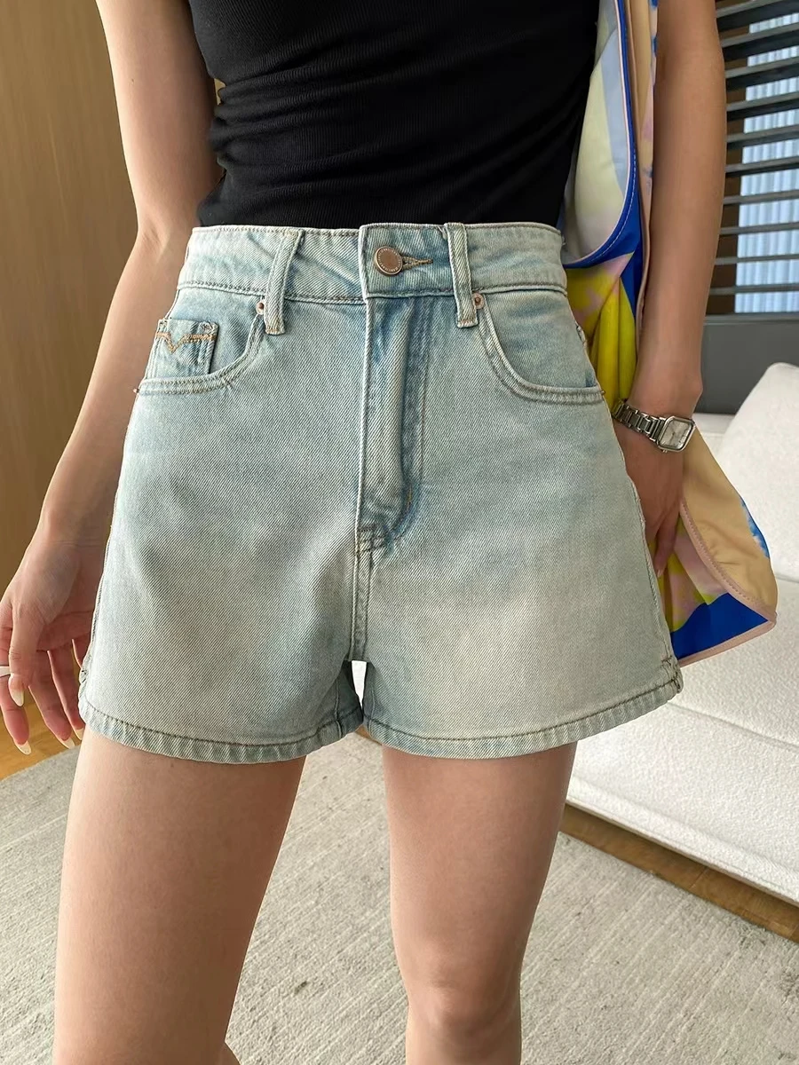 

Casual Blogger Style Soft Denim Distressed White High Waisted Hot Pants A-Line Slimming Shorts