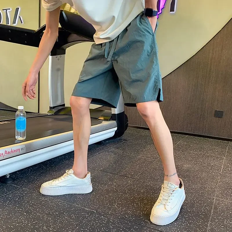 

Быстросохнущие свободные мешковатые спортивные шорты на шнурке с карманами для мужчин, спортивные шорты для бега в корейском стиле, роскошные мужские короткие брюки