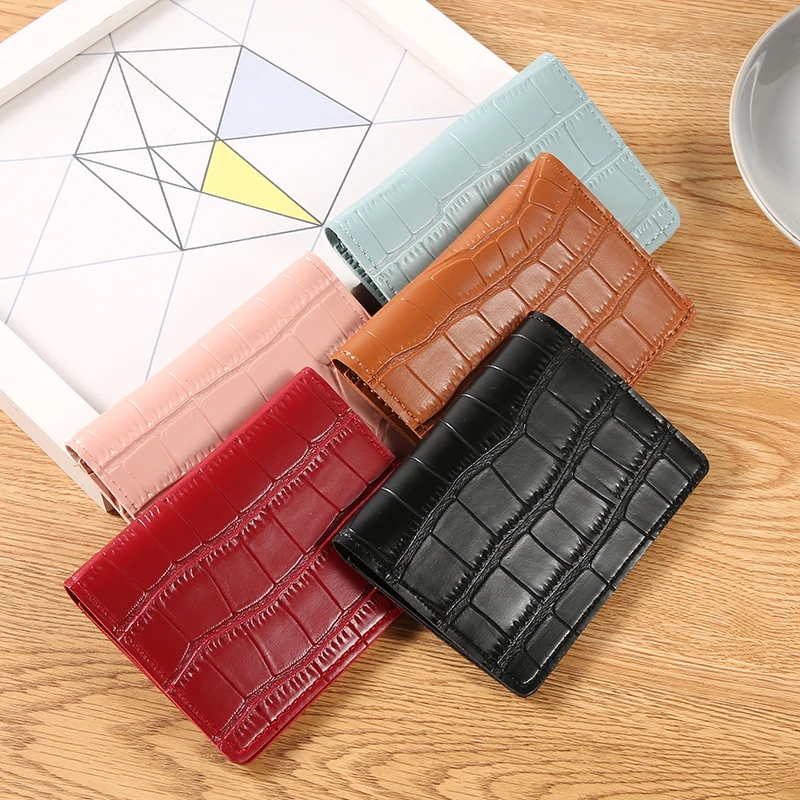 Ladies' new short card wallet with small buckle; two-fold design; exquisite and versatile; perfect for storing coins and cards