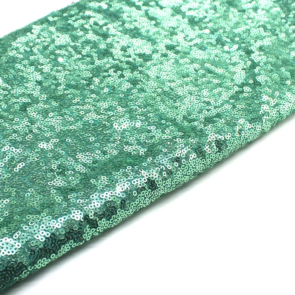 Tessuti di pizzo con paillettes da 1 metro per abito Tessuto ricamato all-over verde menta Tovaglia con paillettes da 3 mm di dimensioni 132 cm