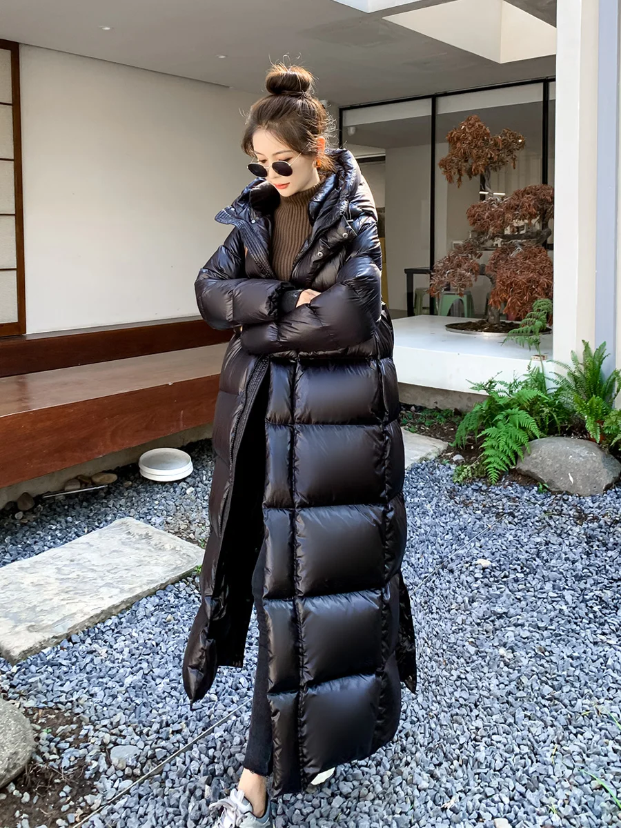 Schwarze Frauen Daunen mantel Winter verdickt warme Kapuze Reiß verschluss lange Puffer Parka weibliche 90% Daunen mantel S-XXXL