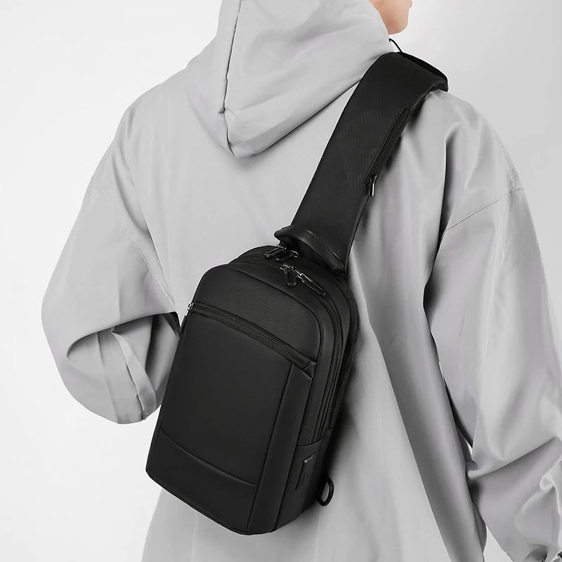 

Simple Men's Business Travel Chest Bag with USB Charging Port Multi Pockets Crossbody Bags for Men Waterproof Sling Shoulder Bag
