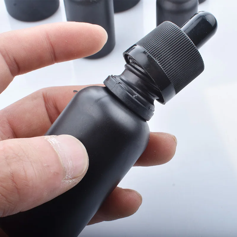 6pcs 100ml 50ml 30ml 20ml 15ml 10ml 5ml Matt black glass essential oil dropper bottle essential drop vials Cosmetic Containers