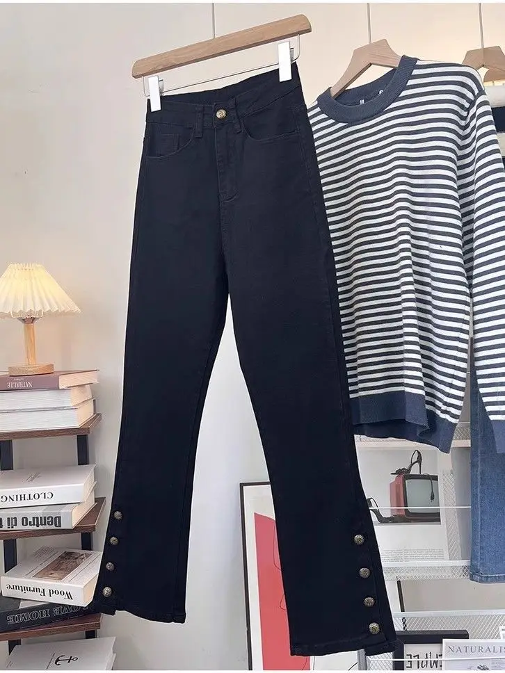 Irregular breasted pants female autumn new large size loose elastic high waist slim fashion design sense niche jeans.