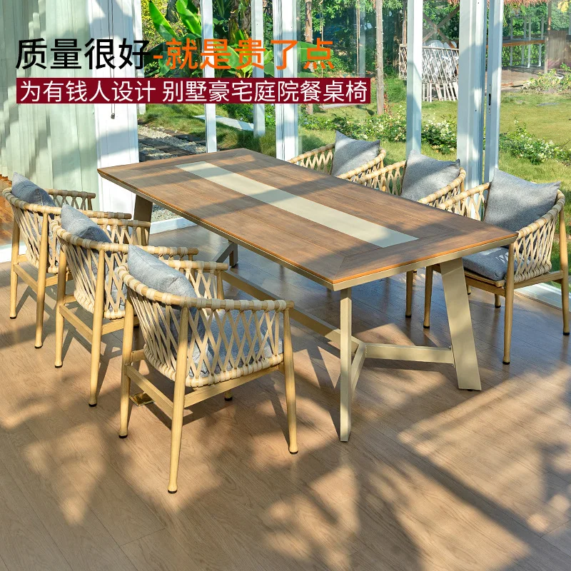 Nordic outdoor balcony dining table and chairs villa courtyard sun room hotel garden outdoor leisure rope rattan chair furniture